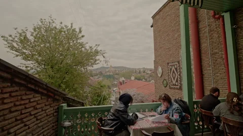 Terrace Restaurant Above The Rooftops Of Old Tbilisi Video stock 346736723