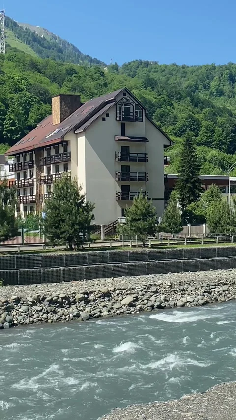 Terraces of hotel provide views of surrounding mountains Stock Footage 278317557