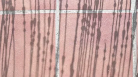 Terracotta Tile Wall With Vertical Shadows Creating Abstract Linear Pattern Stock Footage 340632426