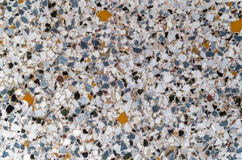 Terrazzo stone aggregate floor pattern in interior surface Stock Photos