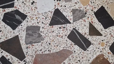 Terrazzo tiles are a composite material composed of marble and granite chips Stock Footage 325984269