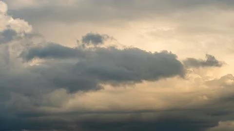 A terrible black cloud hangs in the sky before the rain. Bad weather. Hurrica Stock Photos