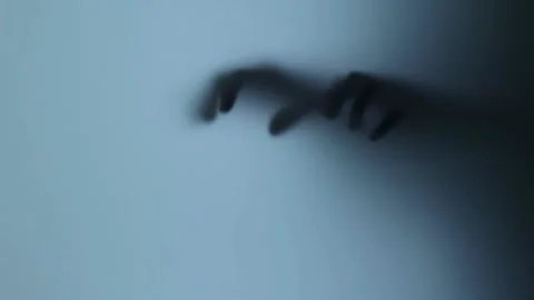 Terrible blurred shadow creeps outside the window. The concept of horror Stock Footage 225423198