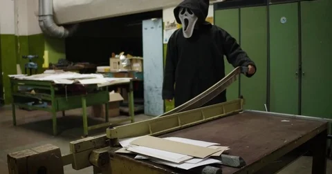 A terrible character that cuts the guillotine Stockbeeldmateriaal 79959804