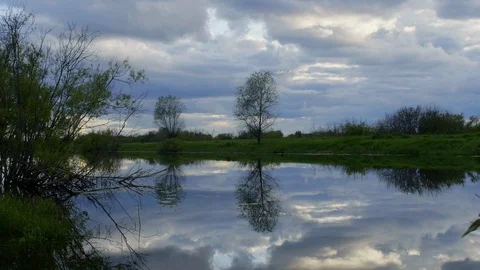 Terrible cloud gray sky press unique seascape forest with lake in national park Stock Footage 120049990
