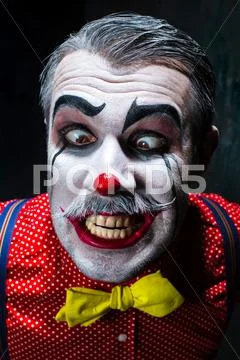 Terrible crazy clown and Halloween theme Stock Photos