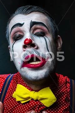 Terrible crazy clown and Halloween theme Stock Photos