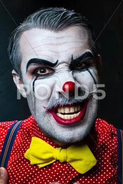 Terrible crazy clown and Halloween theme Stock Photos