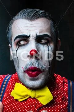 Terrible crazy clown and Halloween theme Stock Photos