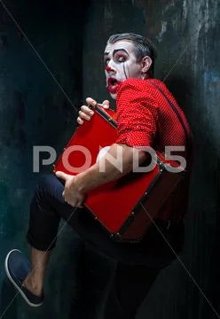 Terrible crazy clown and Halloween theme Stock Photos