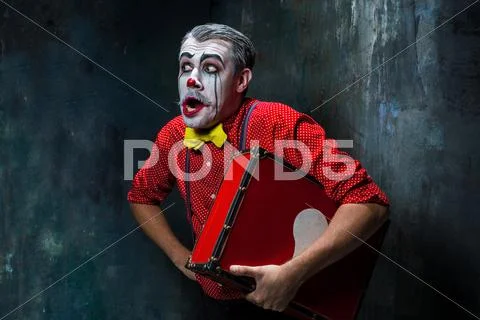 Terrible crazy clown and Halloween theme Stock Photos
