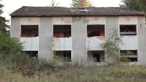 Terrible premises and ruins, a consequence of the war in Ukraine Stock Footage 219330212