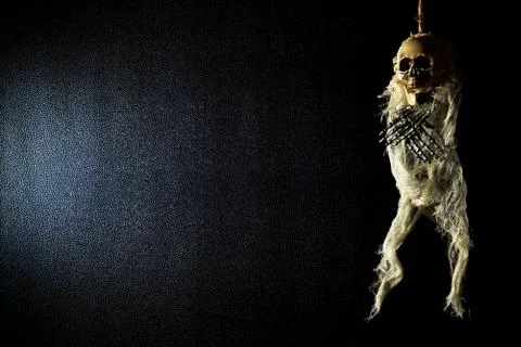 Terrible skeleton on the gallows. Stock Photos