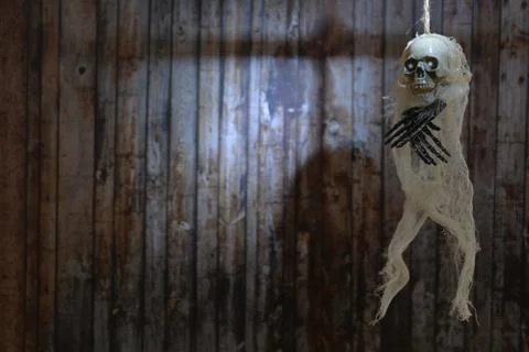 Terrible skeleton on the gallows. Stock Photos