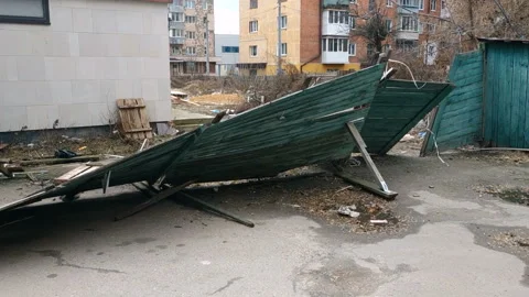 Terrible view dump and broken fence in residential yard Stock Footage 113358856