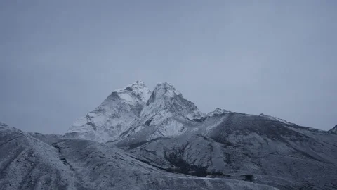 Terrific timelapse. Gloom darkness fall above high frozen snow highlands summit Video stock 167367730