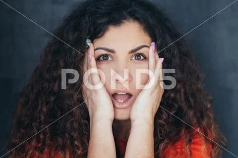 Terrified shocked emotional lady portrait Stock Photos