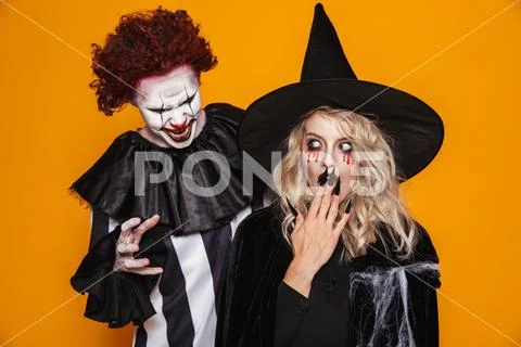 Terrifying clown scary blonde witch isolated Stock Photos
