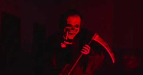 Terrifying Grim Reaper Portrait In Red Light At Halloween Party Stock Footage 314966976
