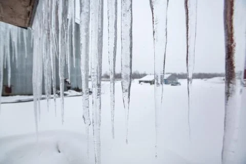 Territory of Central Heating and Power Plant  and icicles on the roof Stock Photos