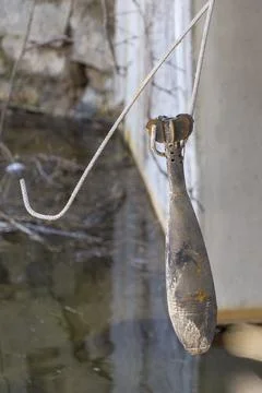 The territory of the house is mined. Demining by troops of the territory. Man Stock Photos