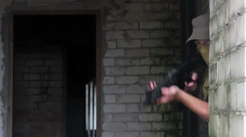 Terrorist aiming a machine gun in enemy 03 Stock Footage 51644342