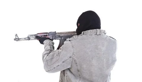 Terrorist with ak47 machine gun Stock Photos