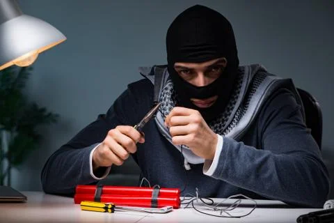 Terrorist bomber preparing dynamite bomb Fotos Stock