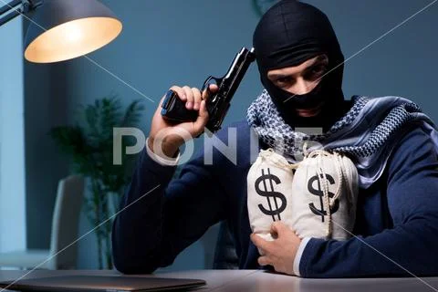 Terrorist burglar with gun asking for money ransom Stock Photos