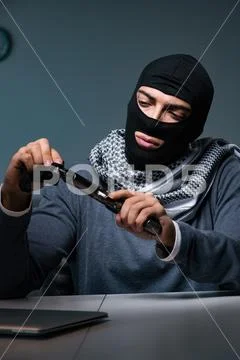 Terrorist burglar with gun asking for money ransom Stock Photos