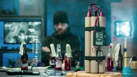 Terrorist concept. terrorist makes bombs and molotov cocktails Video stock 99767287