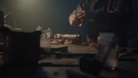 A terrorist creating an explosive at home Vídeo Stock 256022203