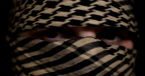 Terrorist eyes closeup CSI Stock Footage 87252210