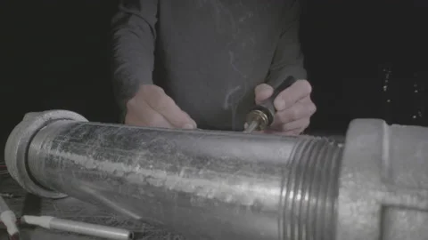 TERRORIST MAKES A PIPE BOMB.  4K, LOG.  NO LUT APPLIED Stock Footage 163553287