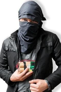 Terrorist puts dynamite bomb in jacket. Terrorism concept. Isolated on white. Stock Photos