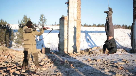 Terrorist shoots hostage Stock Footage 45319952