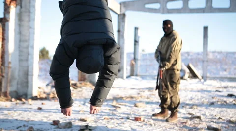 Terrorist shoots man Stock Footage 45320007