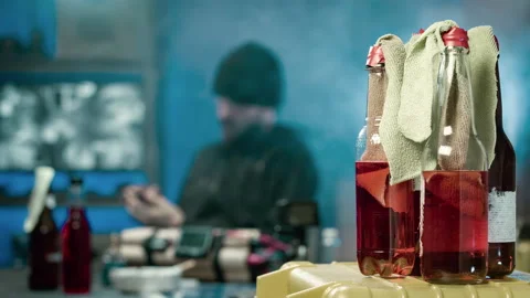 Terrorist standing in the darkness using a stolen mobile phone 스톡 동영상 99767566