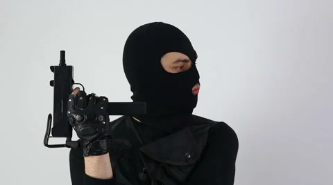 Terrorist with submachine gun on white background Stock Footage 61478989