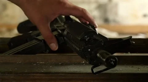 Terrorist takes his weapon, slow motion 1 Video stock 51678700