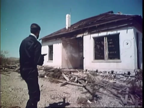 Terrorist training session in a bombed out village Stock Footage 260254954