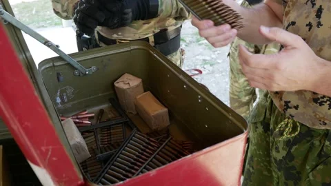 Terrorists choose cartridges automatic weapons Stock Footage 145202157