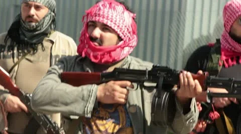 Terrorists walking outside close Stock Footage 11115309