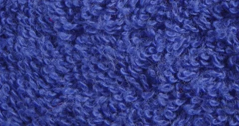 Terry towel texture close up. Blue background. Vidéo 165649900