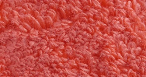 Terry towel texture close up. Red background. Видео 166083942