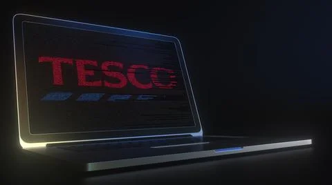 TESCO logo made with computer code on the laptop screen. Editorial conceptual 3d Stock Illustration