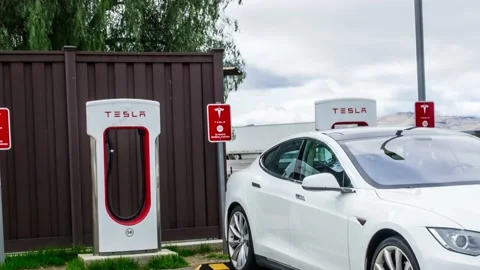 Tesla Charging station along Interstate 5  in California Stock Footage 169126945