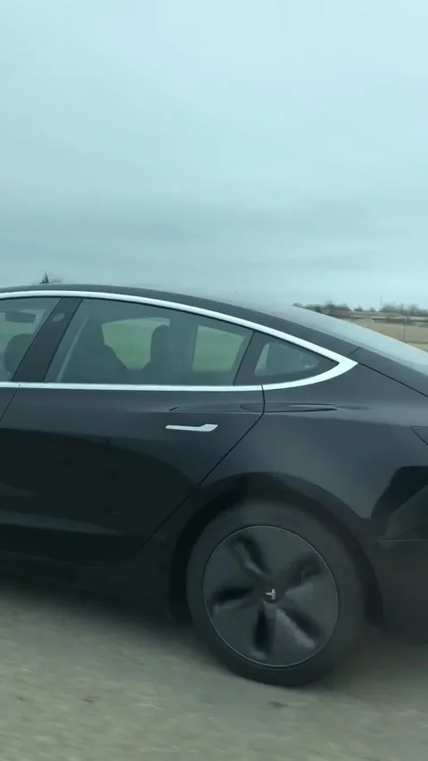 Tesla Driver Appears to Sleep on Autopilot, Dallas, Texas, USA - 11 Mar 2019 Stock Footage 308973717