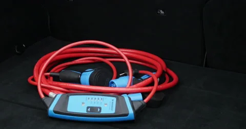 Tesla electric car charging cable inside trunk Video stock 49788707