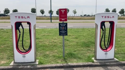 Tesla EV charging station close up 動画素材 313420262